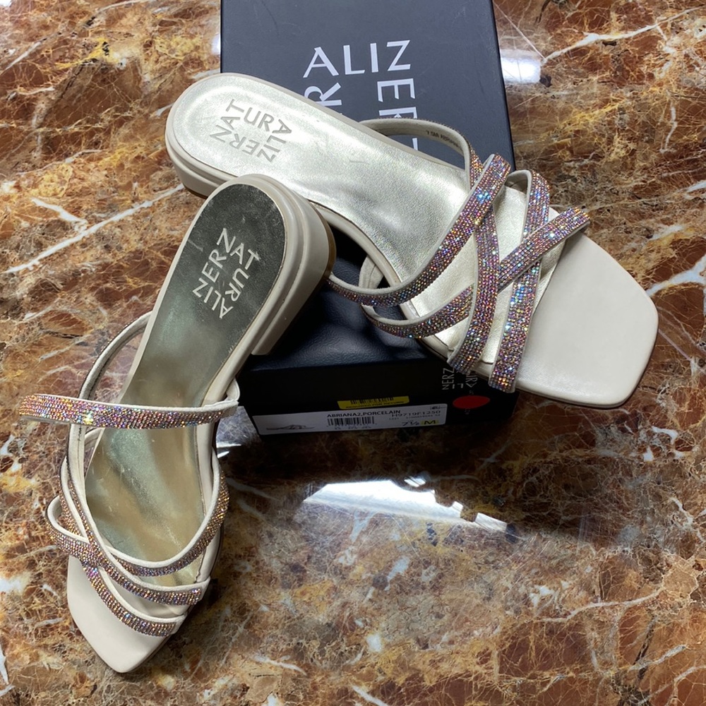 New in box. Naturalizer cream with rose gold sequin straps. Size 7.5